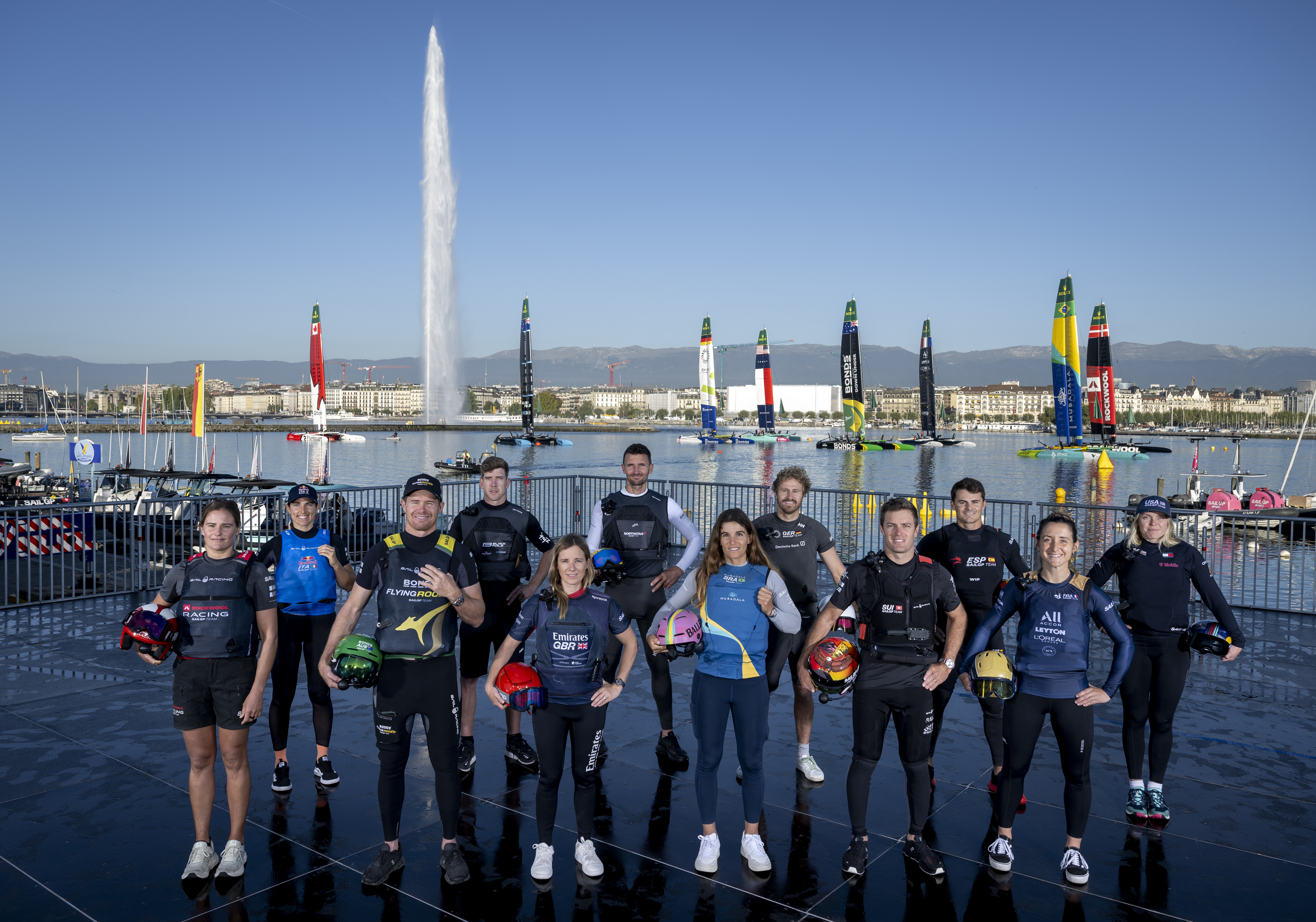 (L-r) Kahena Kunze, strategist of Switzerland SailGP Team,  Maelle Frascari, strategist of Red Bull Italy SailGP Team, Tom Slingsby, driver of BONDS Flying Roos SailGP Team, Peter Burling, co-CEO and driver of New Zealand SailGP Team, Hannah Mills, strategist of Emirates Great Britain SailGP Team, Giles Scott, driver of Canada NorthStar SailGP Team, Martine Grael, driver of Mubadala Brazil SailGP Team, Erik Heil, driver of Germany SailGP Team presented by Deutsche Bank, Sebastien Schneiter, driver of Switzerland SailGP Team, Diego Botin, driver of Spain SailGP Team, Manon Audinet, strategist of France SailGP Team, and Anna Weis, grinder and jib trimmer of USA SailGP Team, in front of the F50 fleet and the Geneva fountain ahead of the Rolex Switzerland Sail Grand Prix held in Geneva, Switzerland Friday 19 September 2025. Rolex SailGP Championship Event 10 2025 Season. Photo: Ricardo Pinto for SailGP. Handout image supplied by SailGP